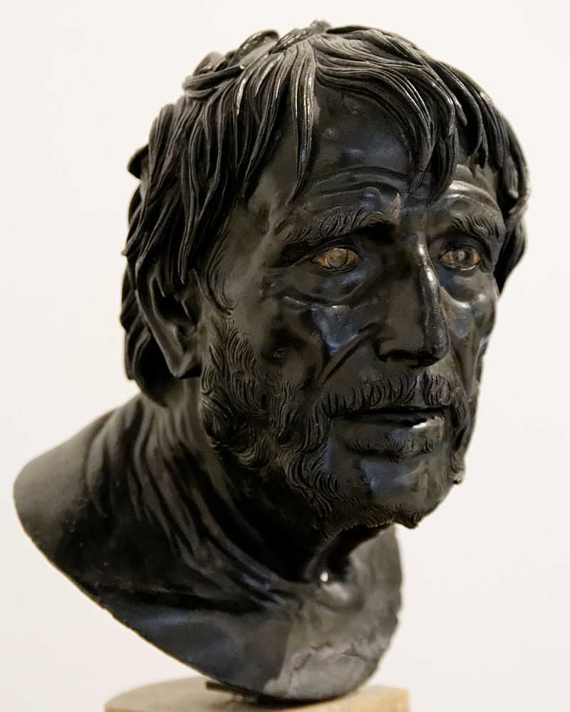 Portrait of Hesiod, from Herculaneum: This portrait has been identified as one of a number of writers and thinkers who were famous in the Hellenistic period, but consensus seems now to suggest the poet Hesiod. The consistency with which Hellenistic sculptors portrayed such luminaries as old reflects an intense level of respect at this time for elderly thinkers who renounced the world of politics and riches for the life of the mind. Portraits like this suggest that it was not an easy path. Portrait in the National Archaeological Museum, Naples, ca. 200 B.C.
